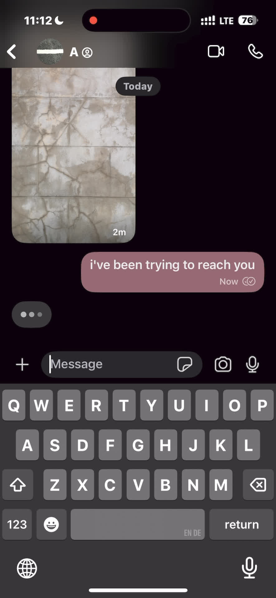 Screenshot of a text conversation, including one image and a text reading "i've been trying to reach you"