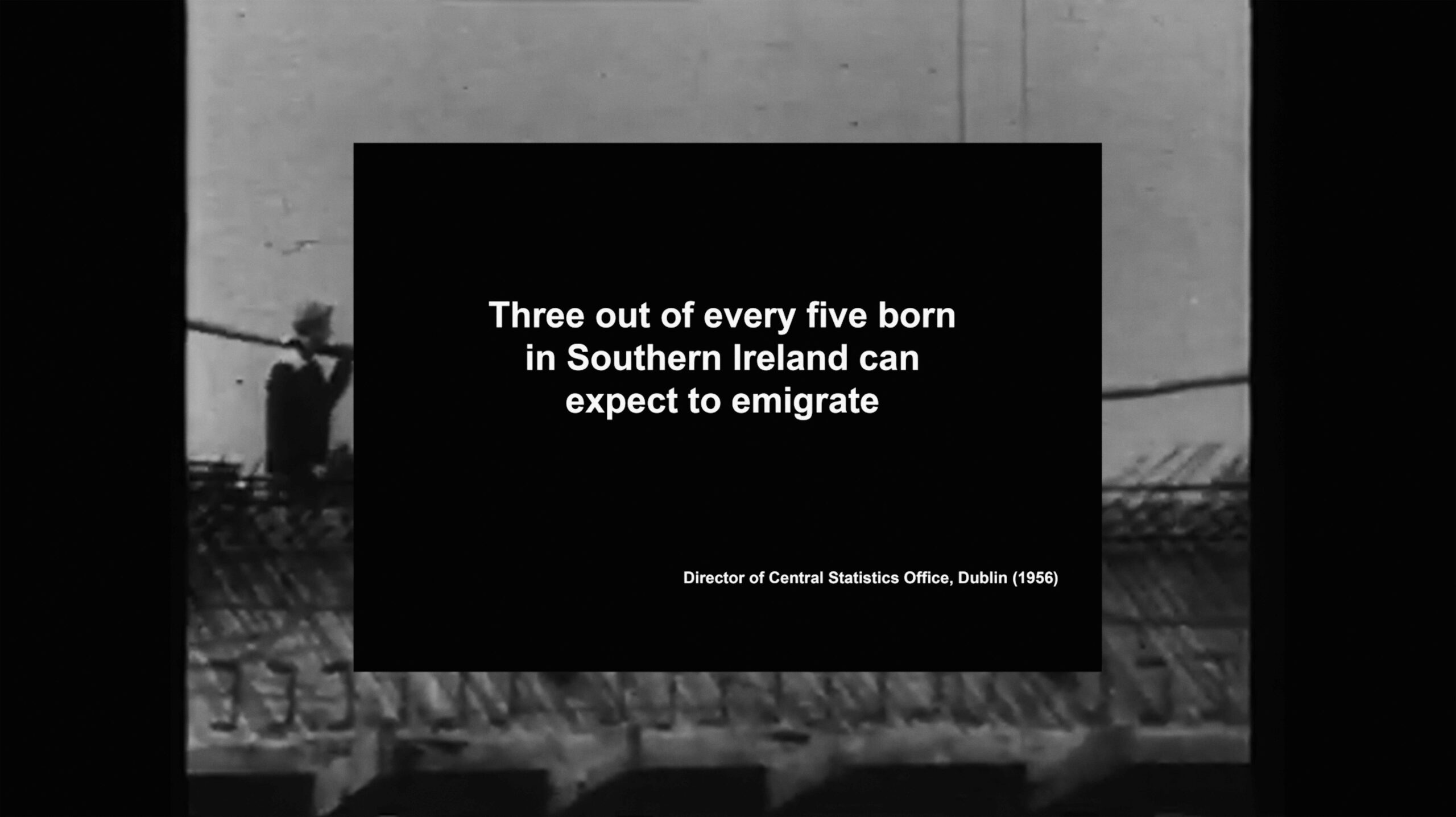 black and white film still displaying text reading "three out of five born in southern ireland can expect to emigrate"