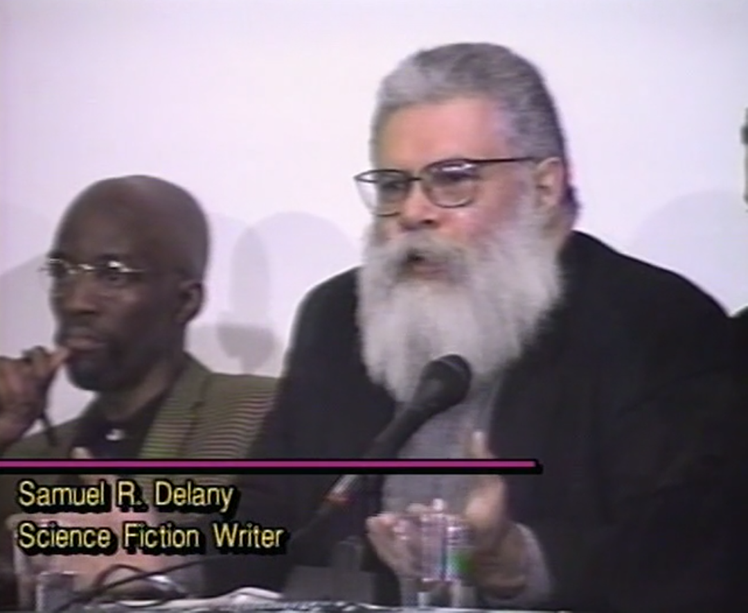 Samuel Delany talking into a microphone